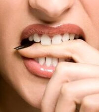 Опасно ли е скърцането със зъби?