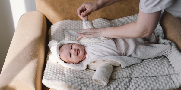 Как да обличаме новороденото